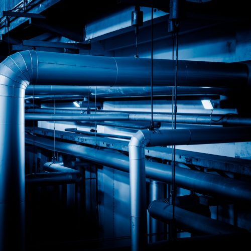 steel pipelines and cables in a plant,Industrial zone.